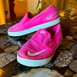 Pink Nike slides
